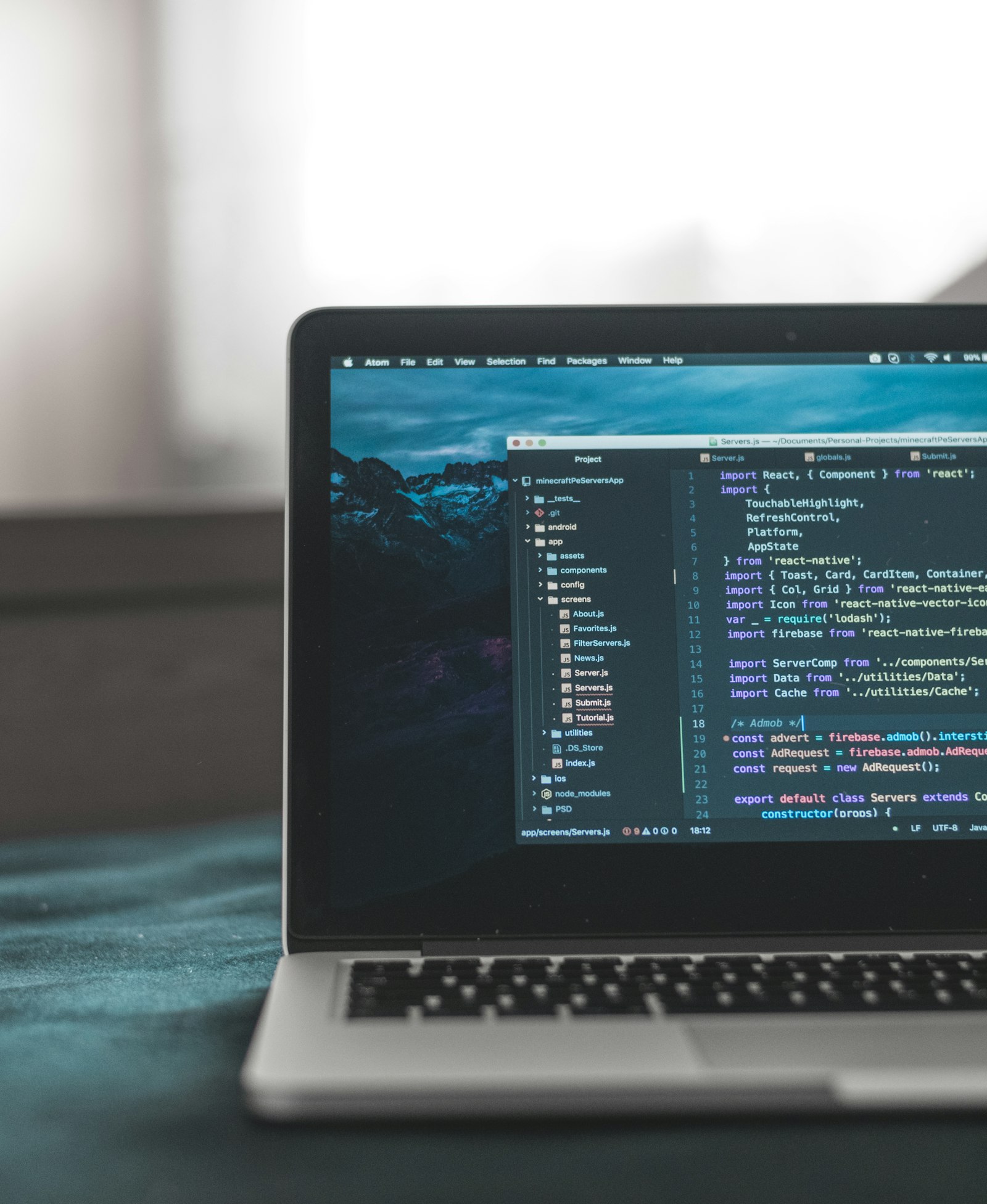 Laptop displaying software code