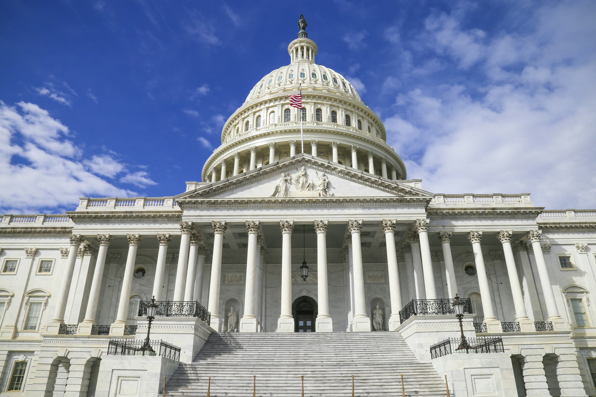 United States Capitol beneath a blue sky